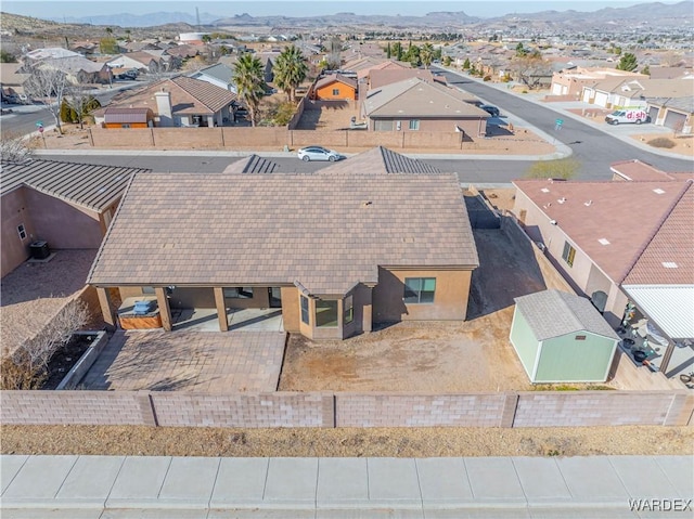 aerial view with a mountain view and a residential view