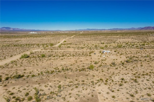 exterior space featuring a desert view