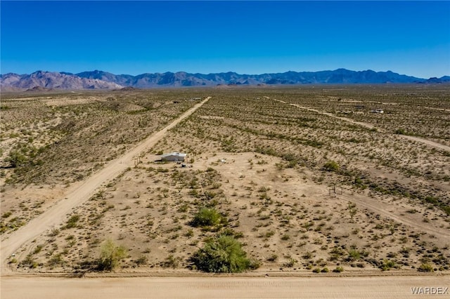 drone / aerial view with a desert view and a mountain view