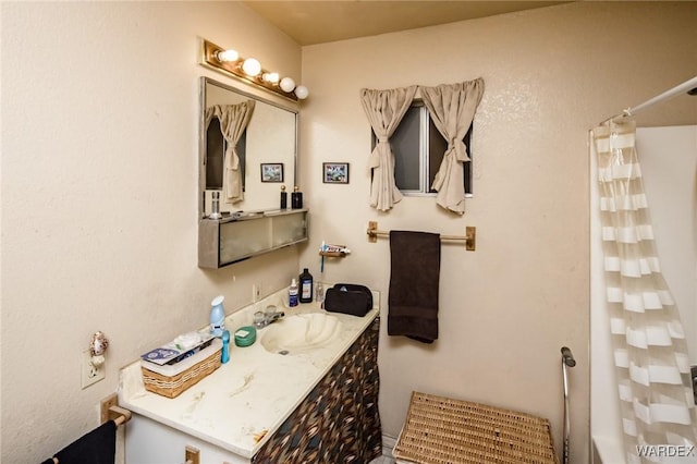 bathroom featuring vanity and a shower with curtain