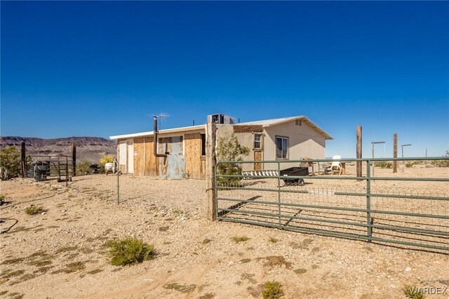 exterior space featuring an outdoor structure, an exterior structure, and a mountain view