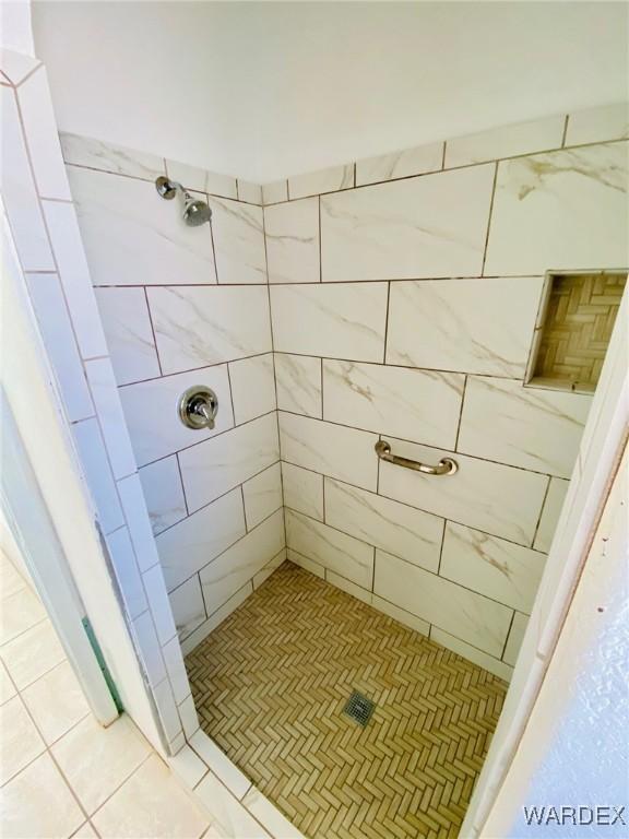 full bathroom with a stall shower