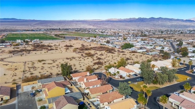 bird's eye view with a residential view and a mountain view