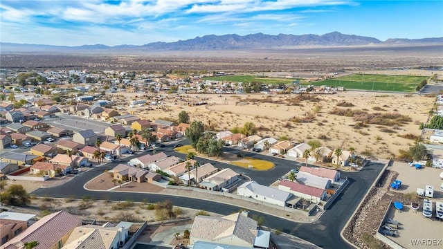 drone / aerial view with a residential view and a mountain view