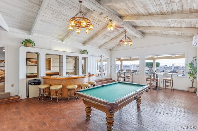 rec room with lofted ceiling with beams, brick floor, wooden ceiling, and a wealth of natural light