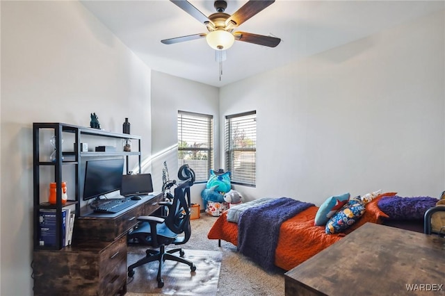 carpeted bedroom featuring a ceiling fan