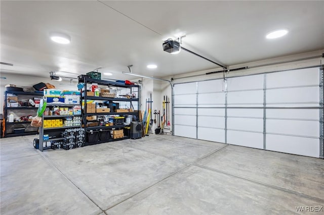 garage featuring a garage door opener