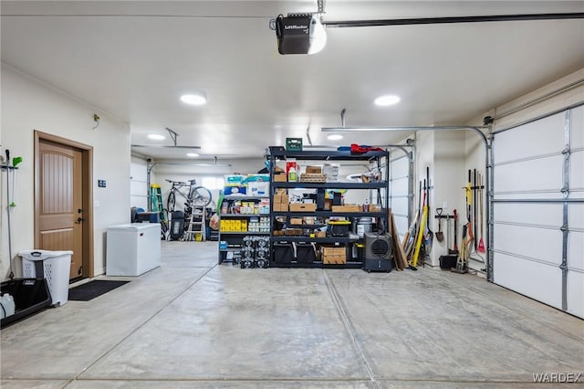 garage featuring a garage door opener