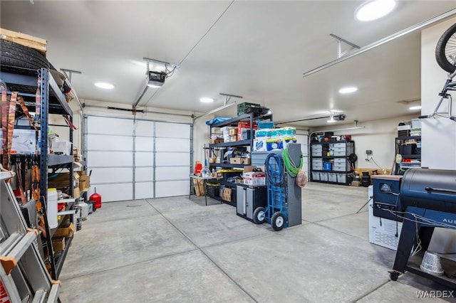 garage featuring a garage door opener