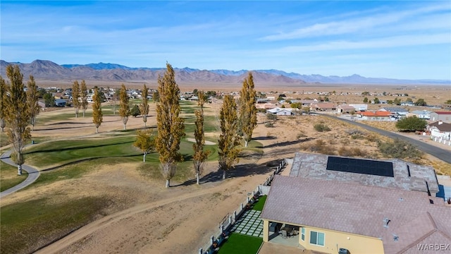 drone / aerial view featuring a residential view and a mountain view