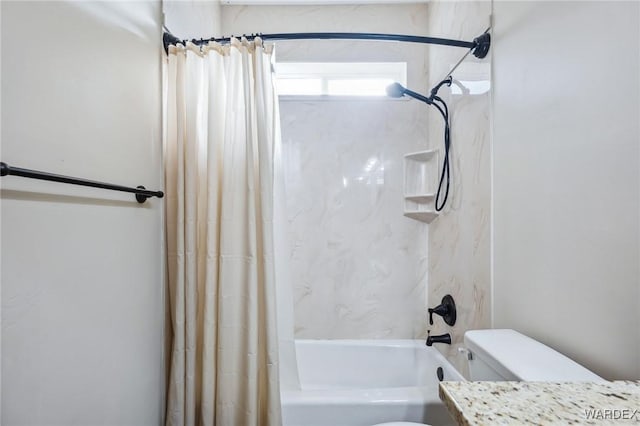 full bathroom with shower / bath combo with shower curtain and toilet