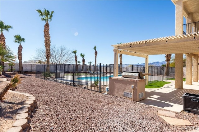 view of swimming pool with a patio area, a fenced backyard, and a pergola