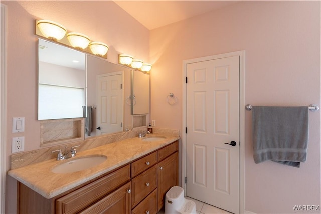 bathroom with double vanity and a sink