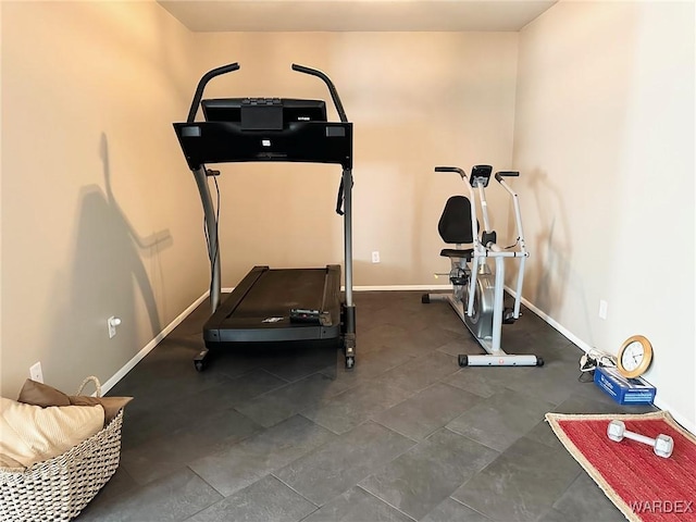 exercise room with baseboards