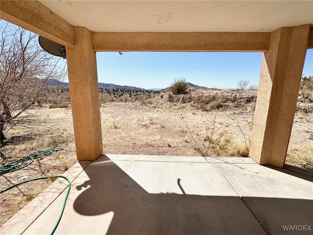 view of patio featuring a mountain view