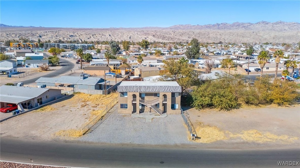 bird's eye view featuring a mountain view and a residential view