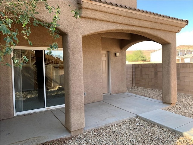 view of patio with fence