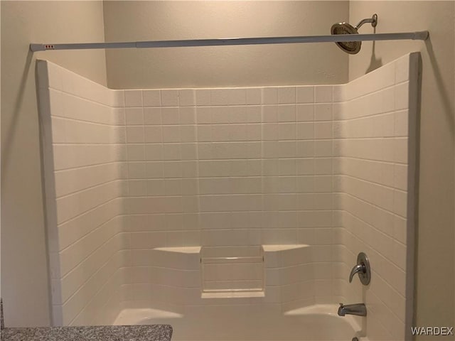 full bathroom with shower / tub combination