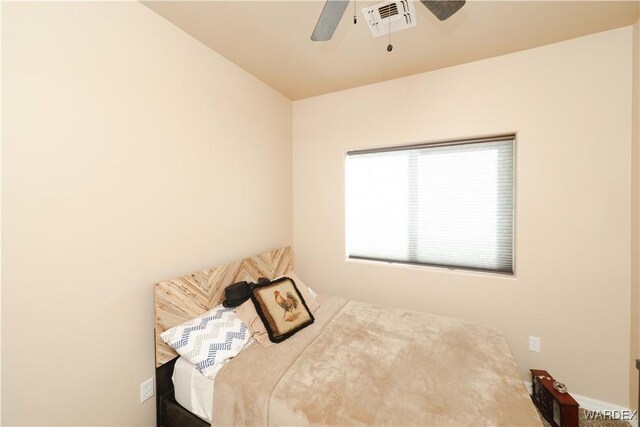 bedroom with visible vents and ceiling fan