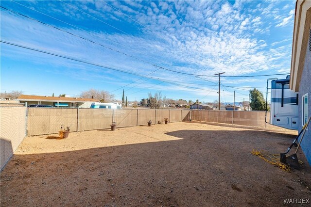 view of yard featuring a fenced backyard