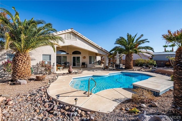 pool featuring a patio area