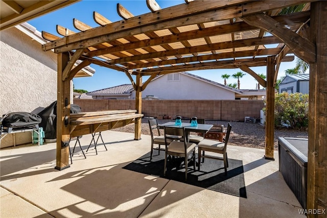 view of patio / terrace with outdoor dining space, grilling area, a fenced backyard, and a pergola