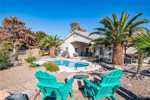 view of pool with a patio area, fence, and a fenced in pool