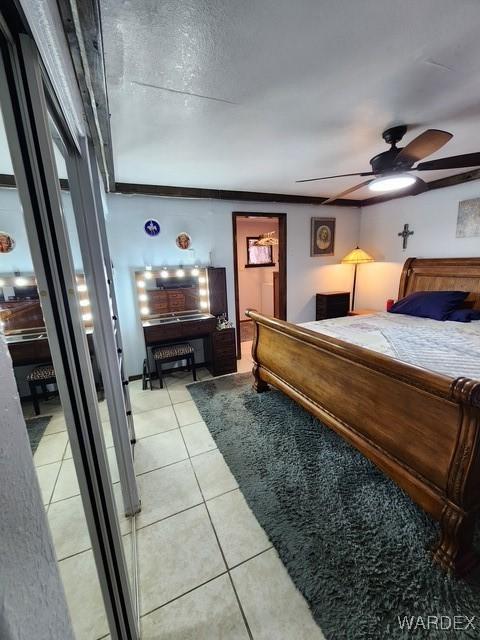 10626 Fenton Dr, Parker, AZ 85344 - bedroom with a ceiling fan and light tile patterned floors