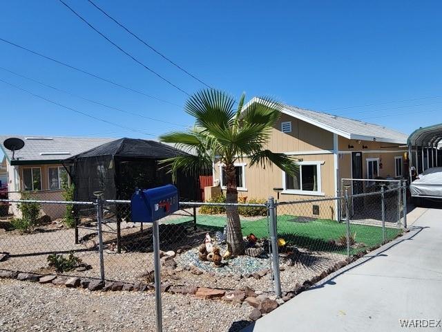 10626 Fenton Dr, Parker, AZ 85344 - view of property exterior with a fenced front yard