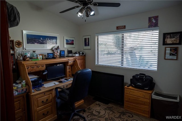 office space with lofted ceiling and ceiling fan