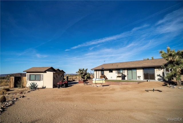 back of house featuring a patio