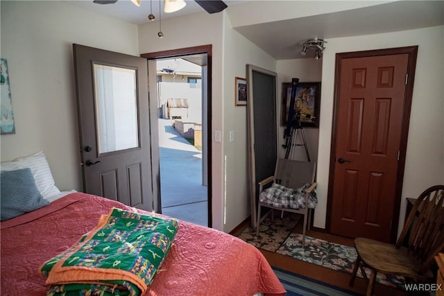 bedroom featuring ceiling fan and access to outside