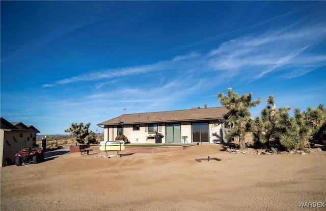 back of house featuring a patio area