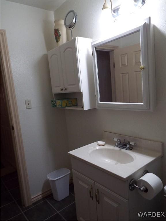 bathroom with vanity and tile patterned floors