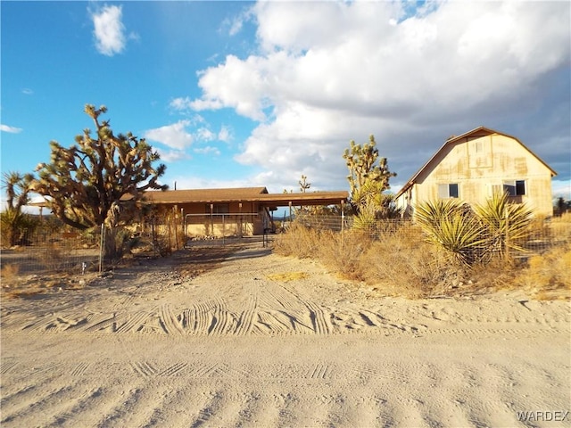 exterior space featuring an outbuilding and a barn