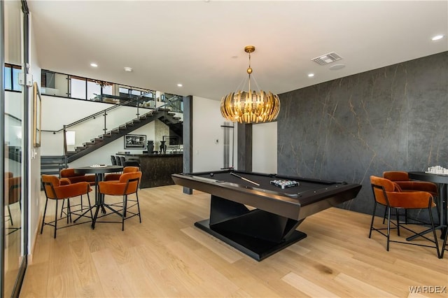 game room featuring light wood-style flooring, recessed lighting, billiards, visible vents, and a bar