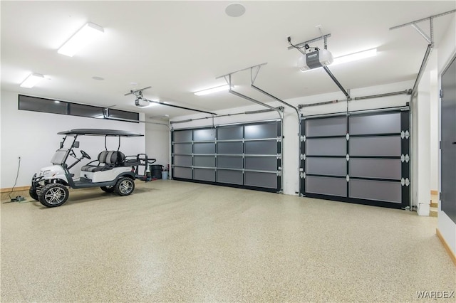 garage featuring a garage door opener