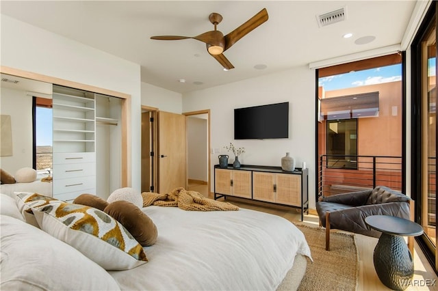 bedroom with a ceiling fan, recessed lighting, a closet, and visible vents