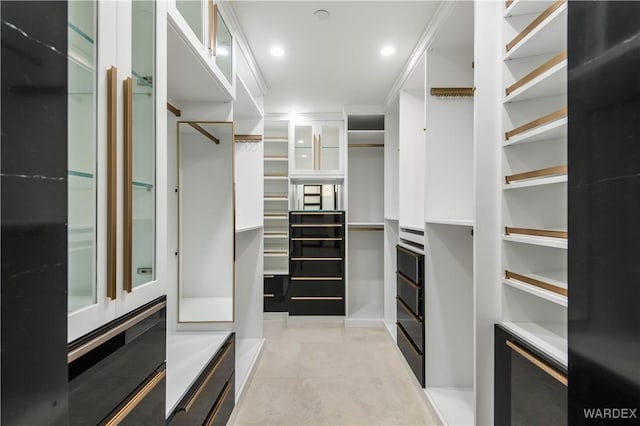 walk in closet featuring light tile patterned floors