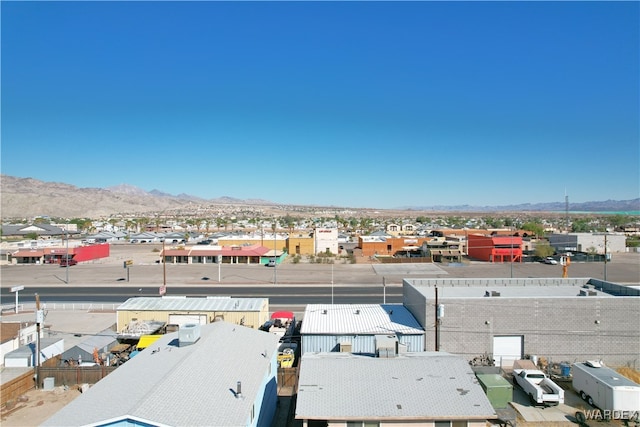 drone / aerial view with a mountain view and a residential view