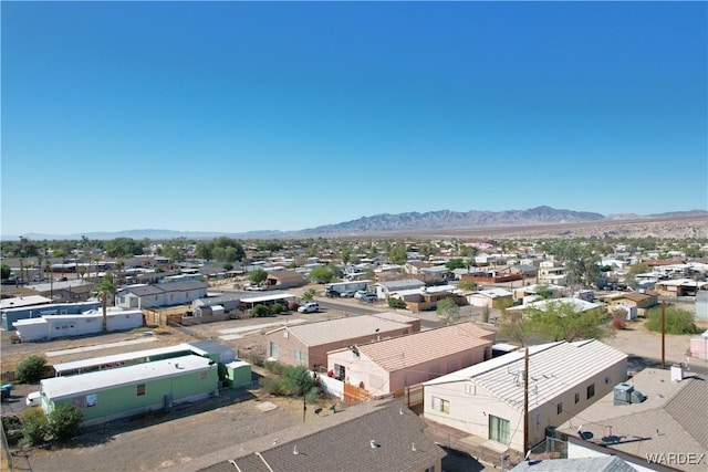 birds eye view of property with a residential view and a mountain view