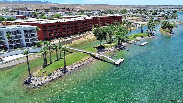 bird's eye view with a water and mountain view