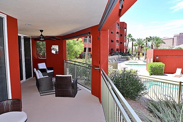 balcony with a ceiling fan and a patio