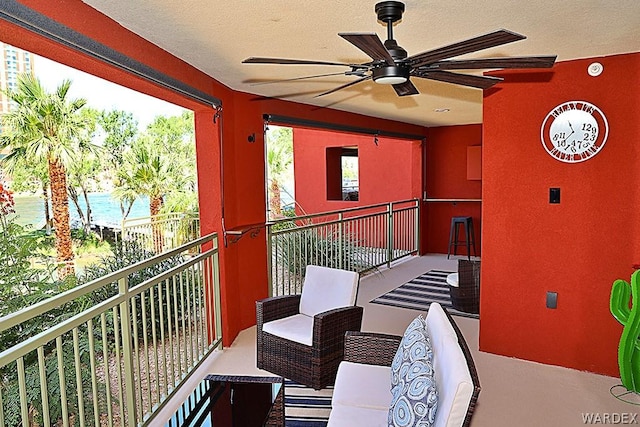 balcony featuring a ceiling fan