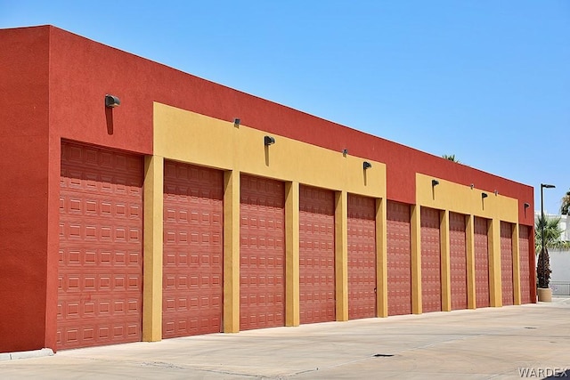 view of property featuring community garages