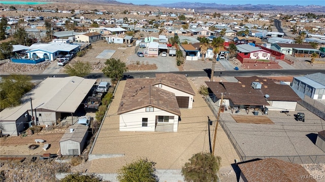 birds eye view of property with a residential view and a mountain view