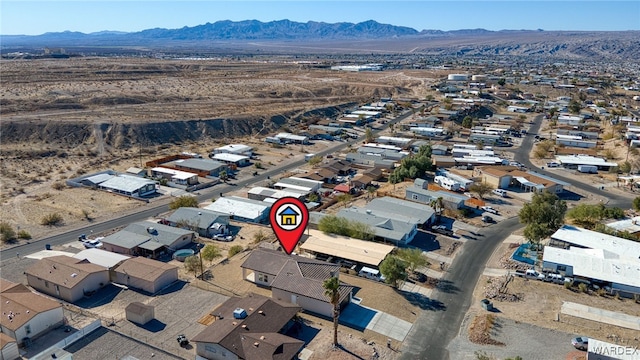 drone / aerial view with a residential view and a mountain view