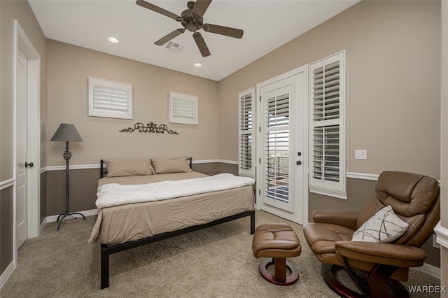 bedroom with access to exterior, recessed lighting, light colored carpet, visible vents, and baseboards