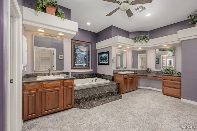 full bath featuring visible vents, a ceiling fan, vanity, a bath, and recessed lighting