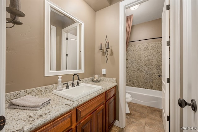 bathroom featuring toilet, shower / bath combination, and vanity